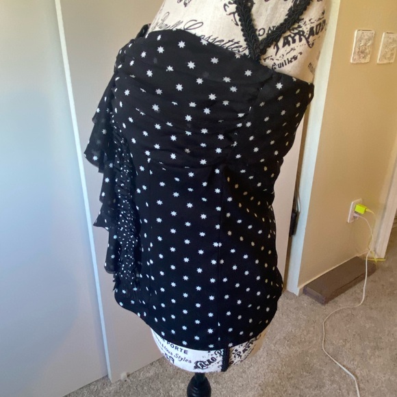 A strapless top with little tiny stars all over it. Ruffled front. - Picture 5 of 7